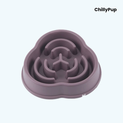 Purple silicone pet bowl with maze design on a light blue background, branded 'ChillyPup'.